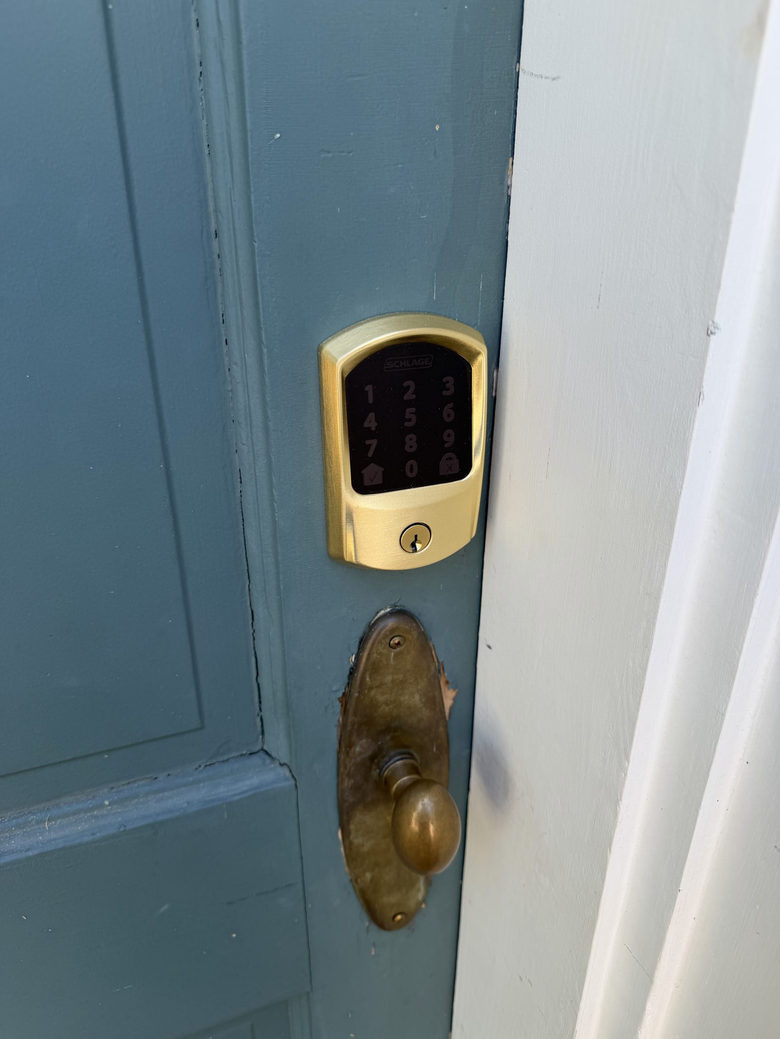 Schlage smart keypad deadbolt professionally installed on a front door