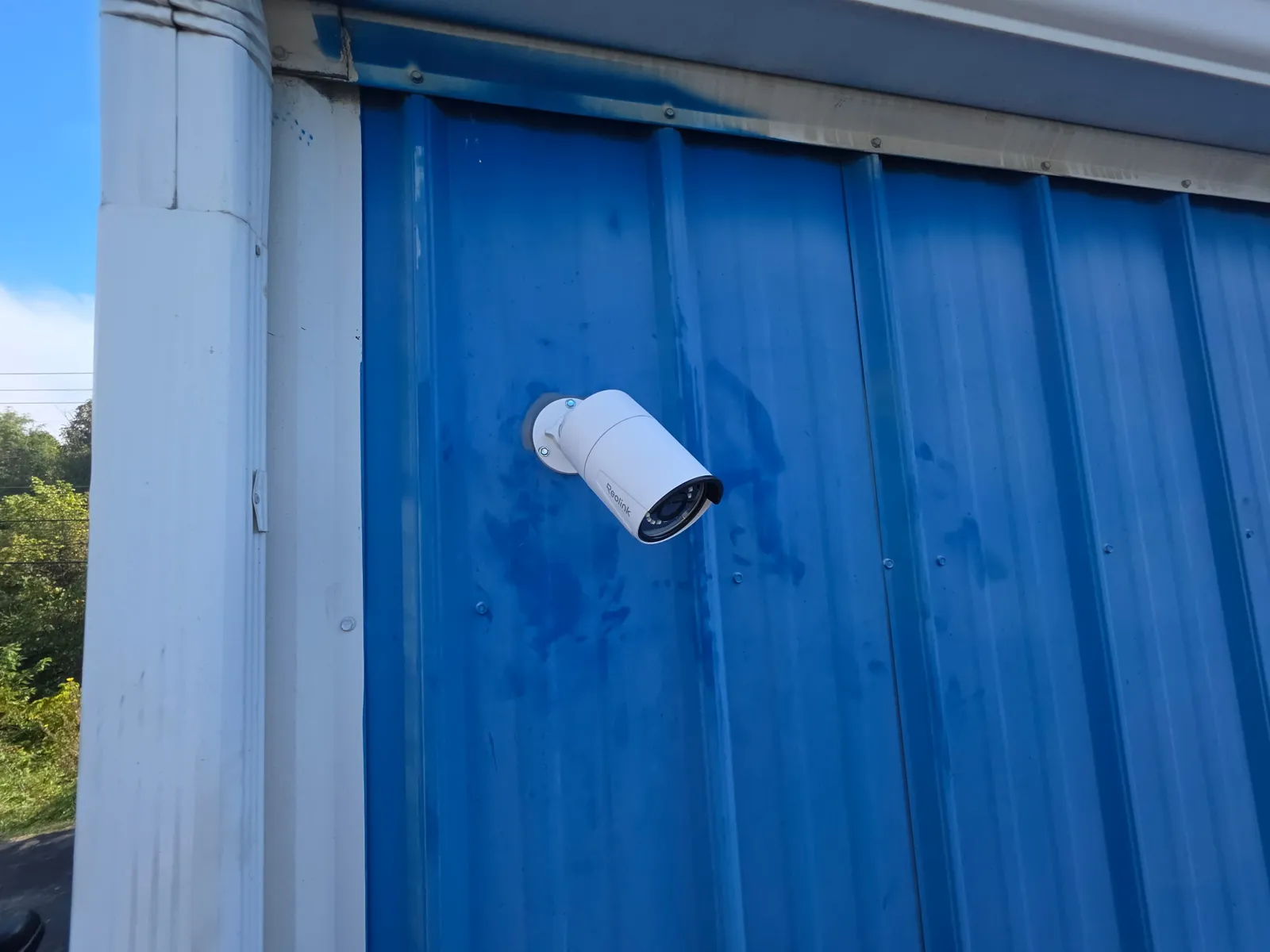 Exterior bullet security camera installed by Zaxx Tech Solutions on a metal building in Christiansburg Virginia