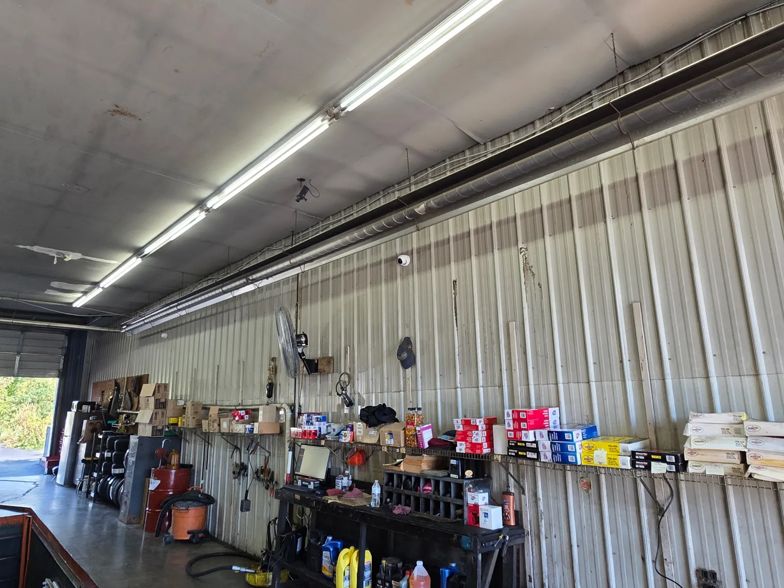 Business surveillance camera installed in the service bay of an auto shop in Southwest Virginia
