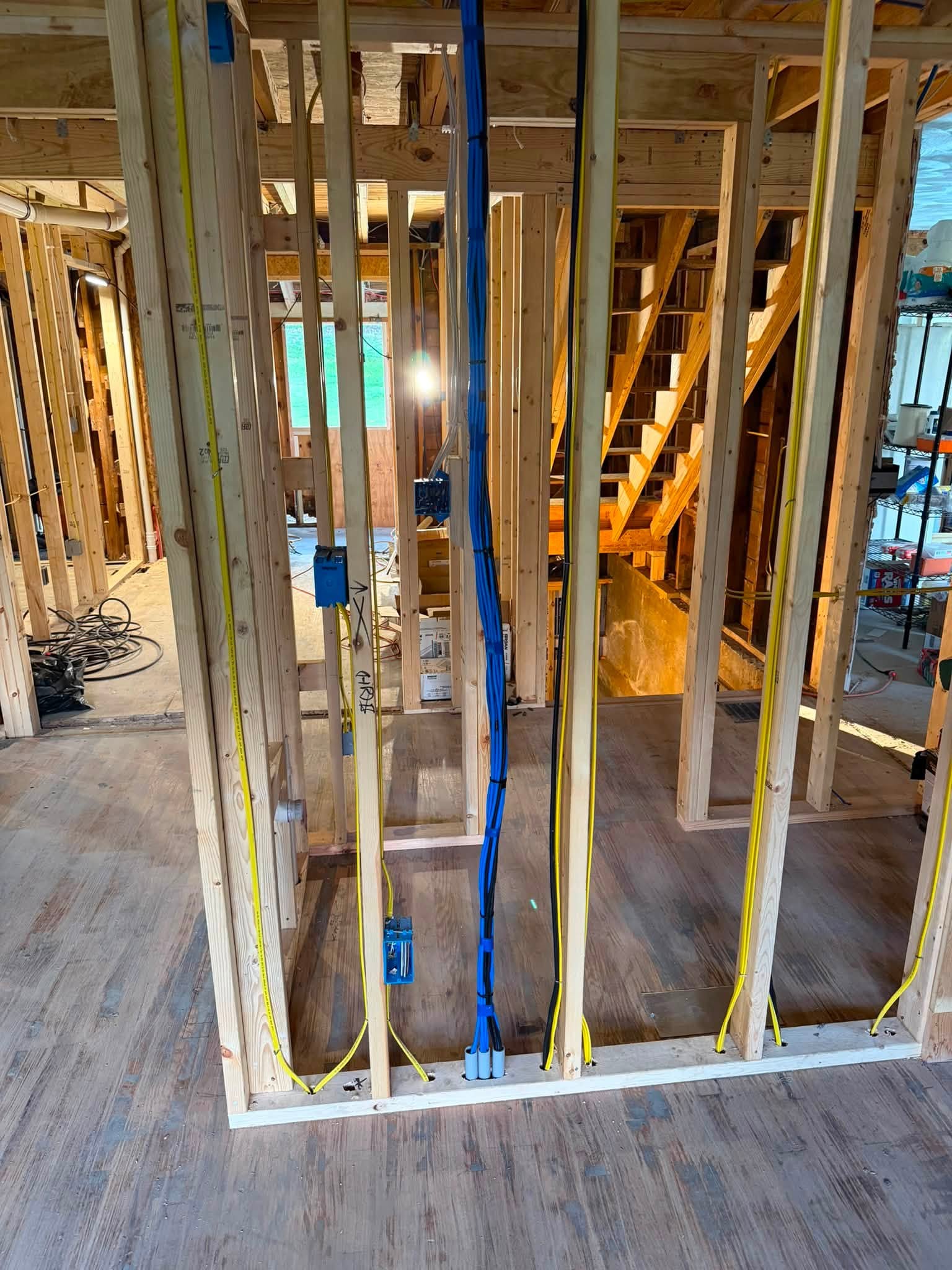 Full wall view of structured cabling rough-in