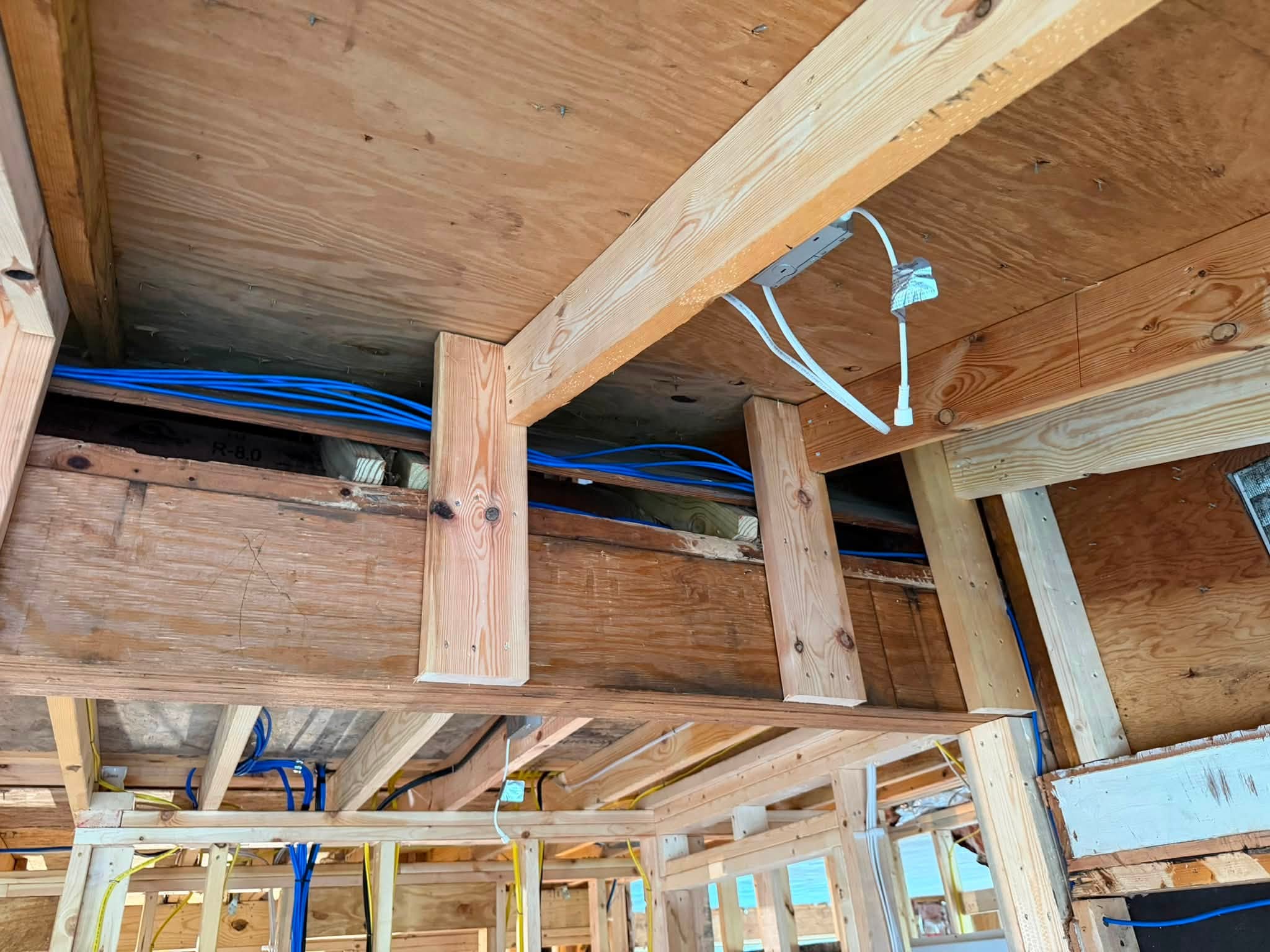 Overhead low-voltage cable runs during construction