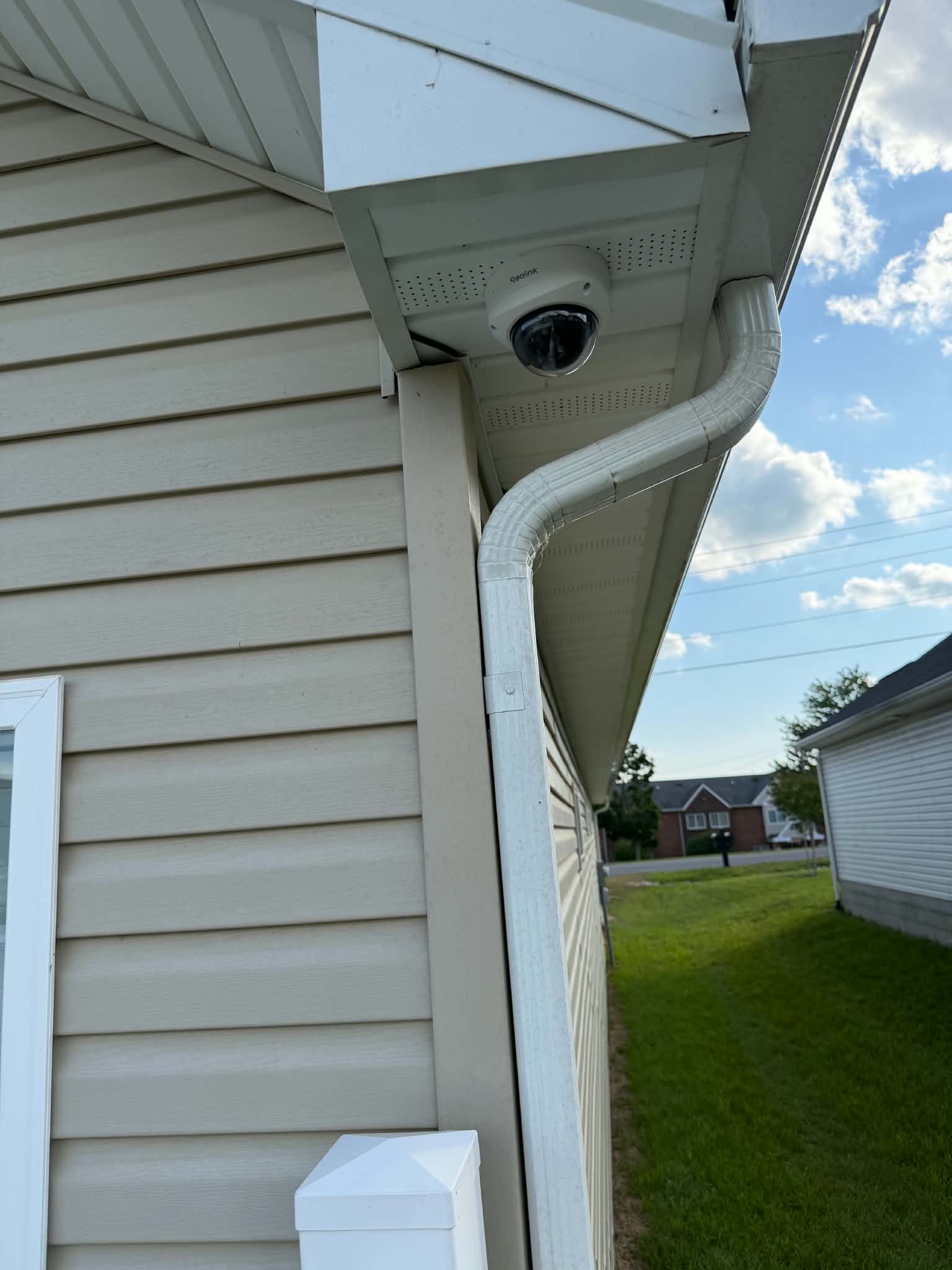 Reolink dome camera — side of house