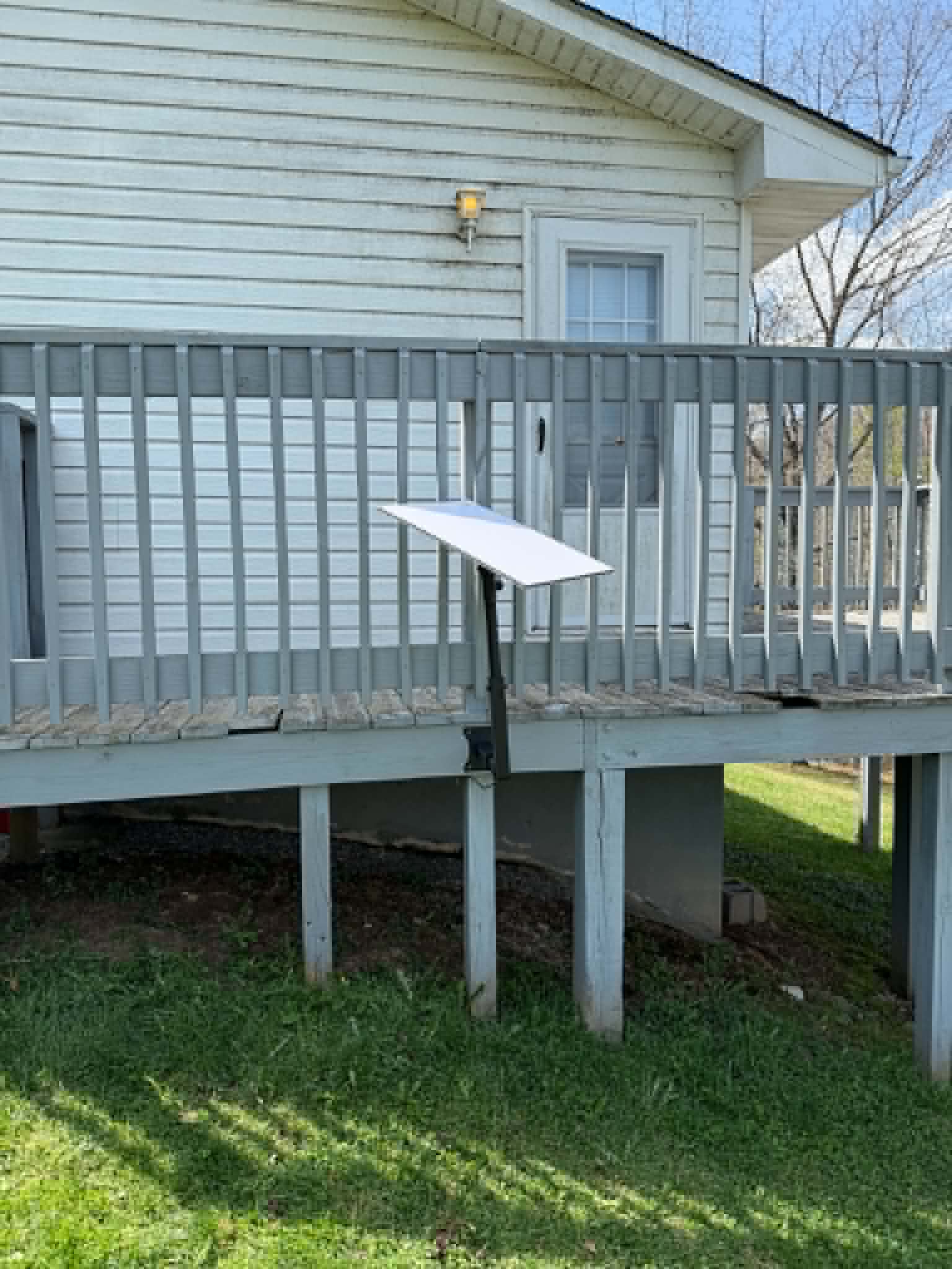 Starlink dish mounted on deck railing
