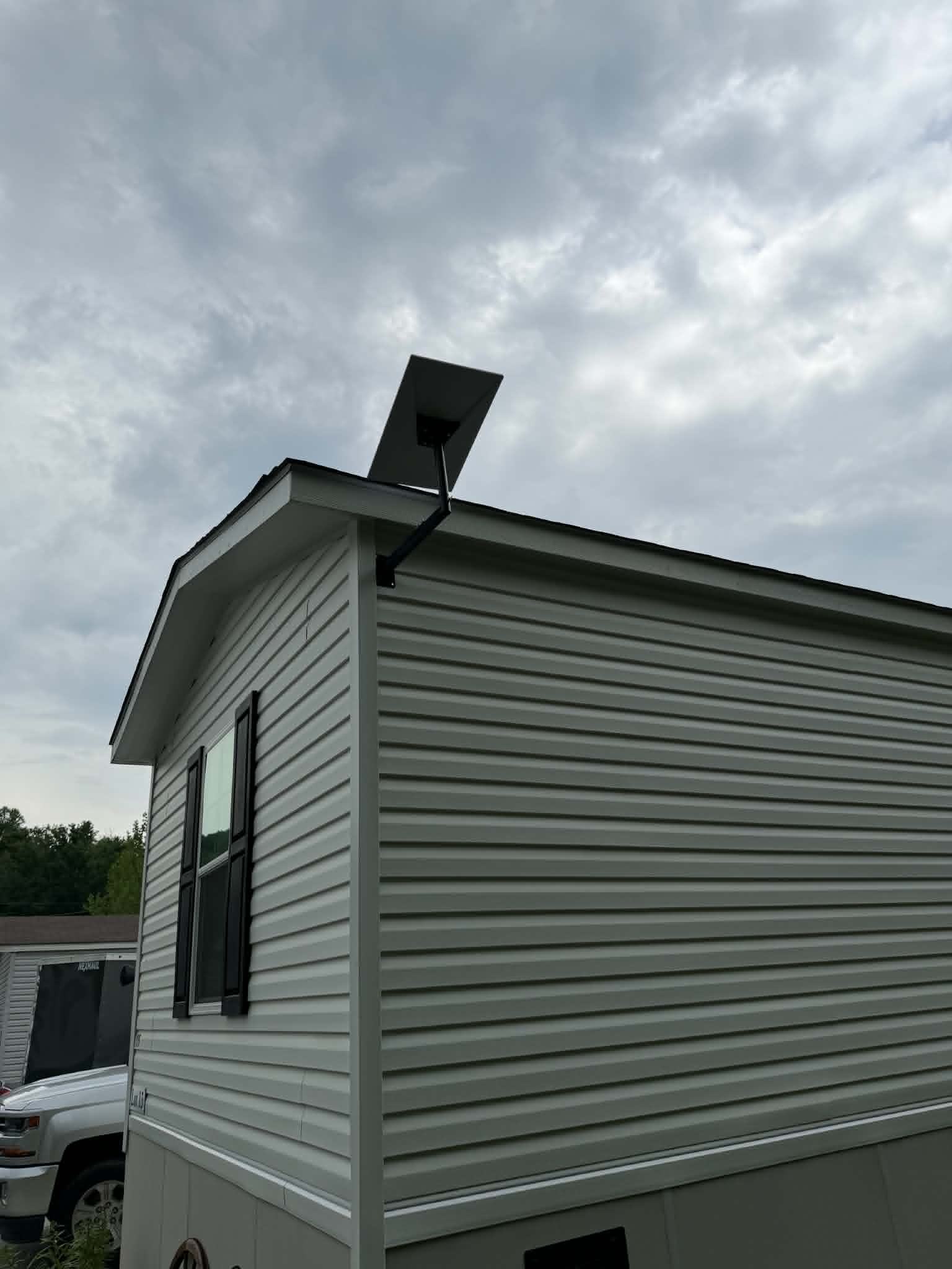 Starlink dish on mobile home roof
