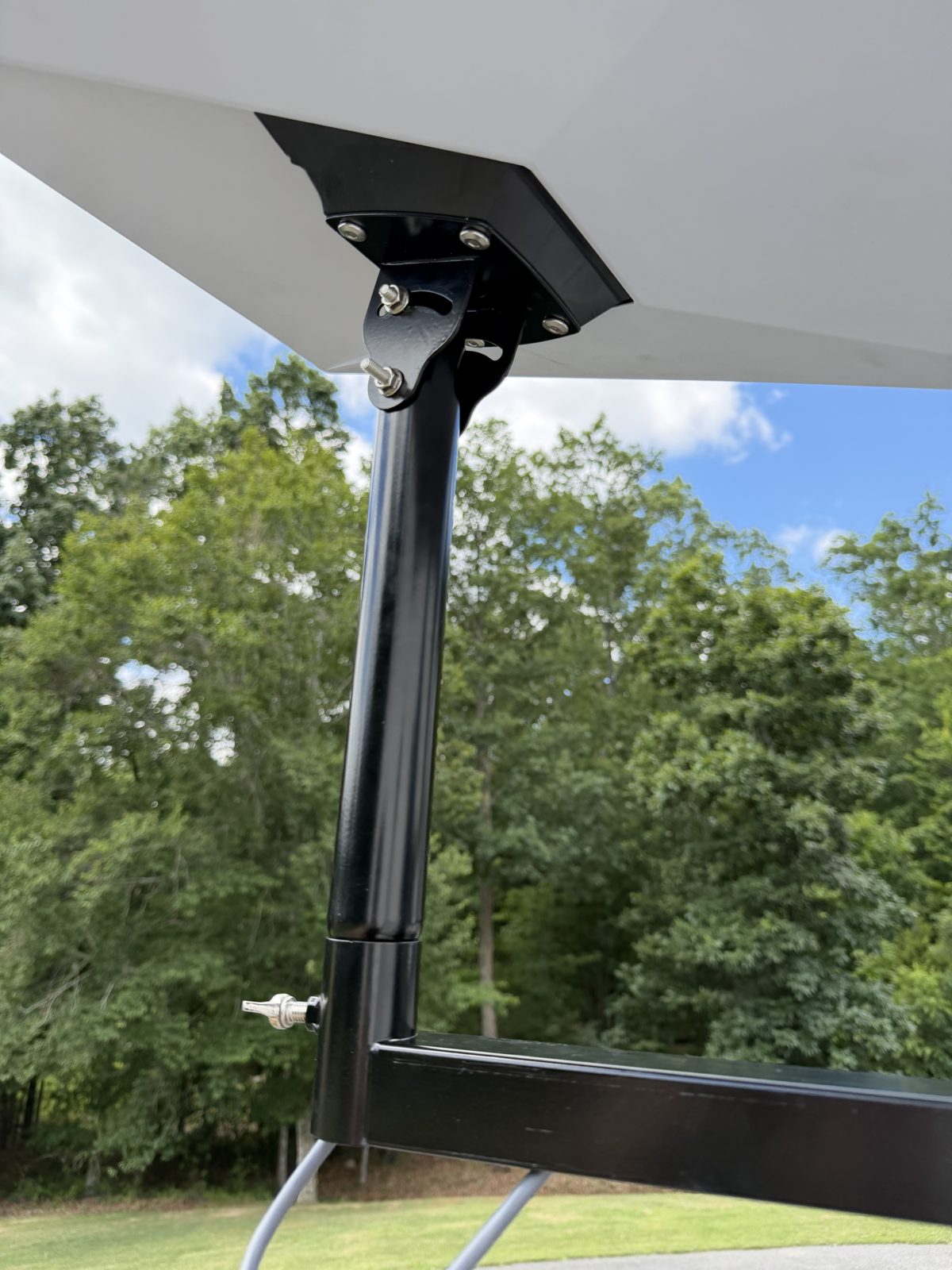 Close-up of Starlink dish mounting bracket and pole hardware