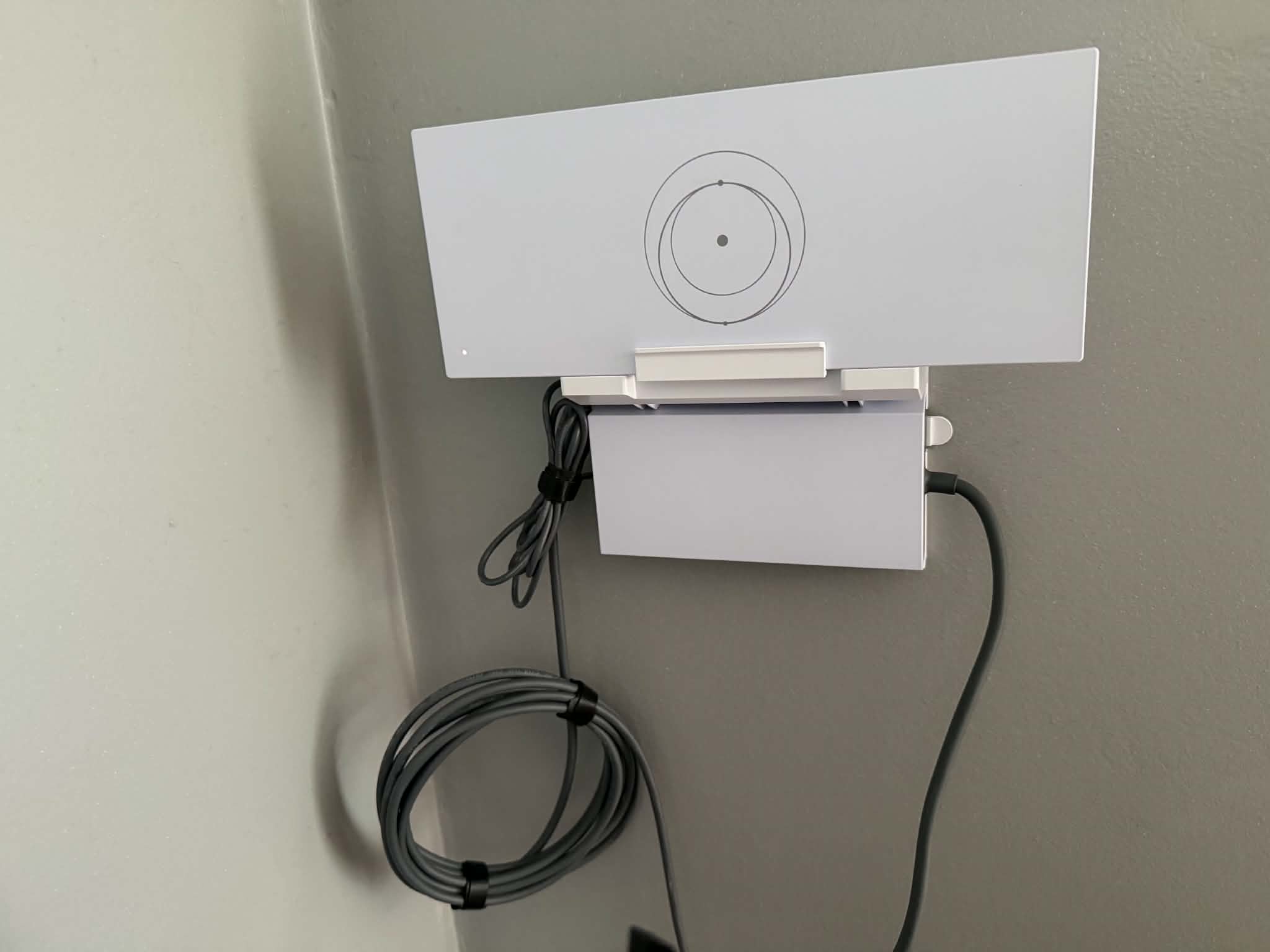 Starlink router wall-mounted in home office setup